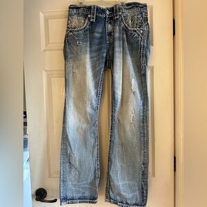Rock Revival Blue Relaxed Jeans with Distressed Design